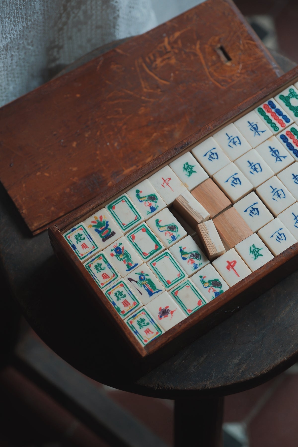 Vintage 1970s Bamboo-Backed Hand-Carved Sichuan style figure tile mahjong set.