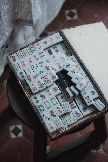 Vintage 1980s Hand-carved calligraphy style mahjong set with black backing
