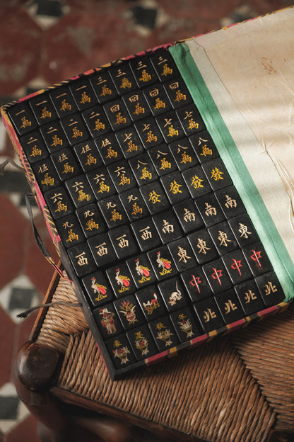 Vintage 1980s hand-carved Bakelite black mahjong set cat tiles.