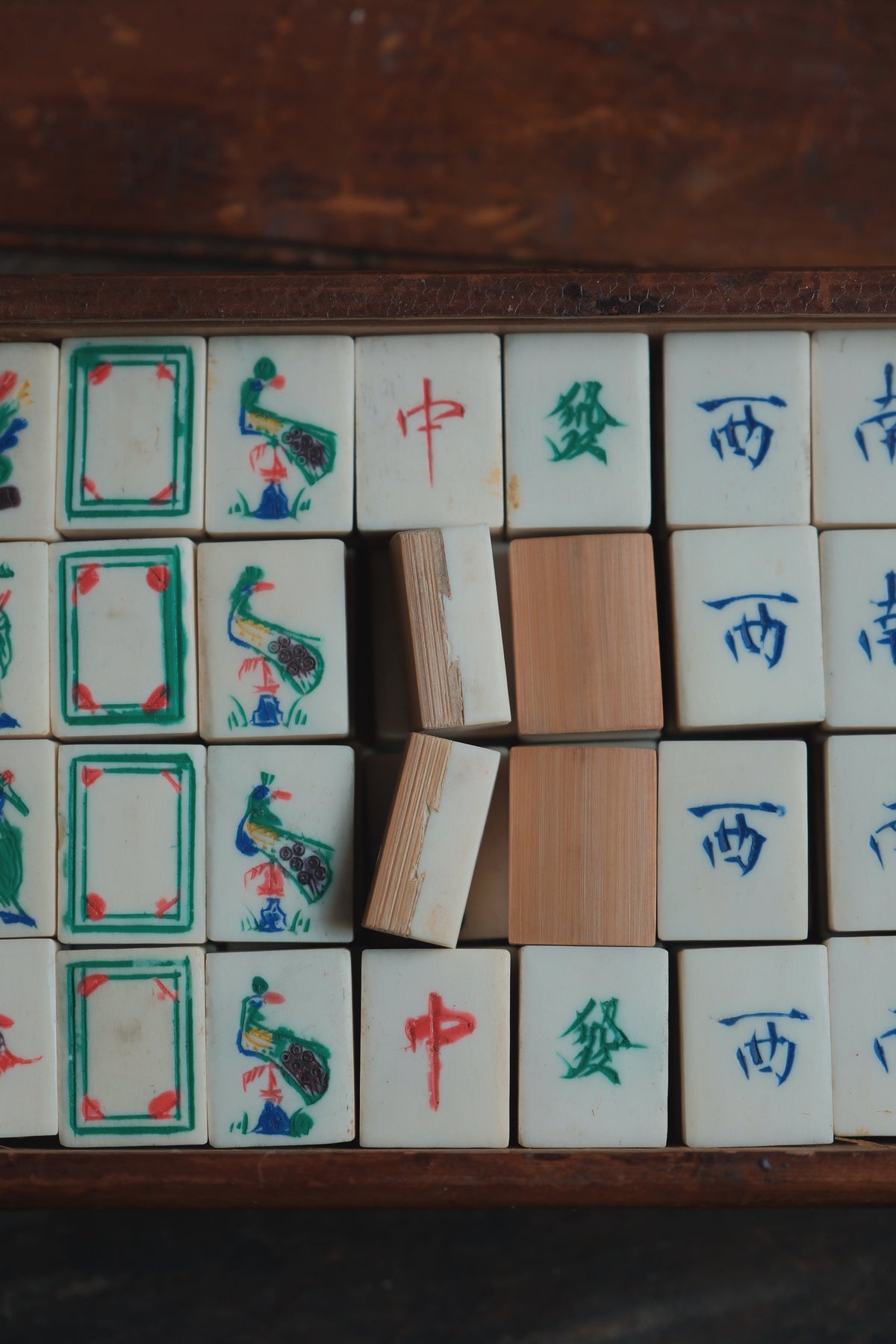 Vintage 1970s Bamboo-Backed Hand-Carved Sichuan style figure tile mahjong set.