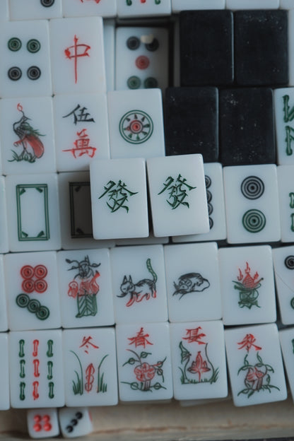 Vintage 1980s Hand-carved calligraphy style mahjong set with black backing