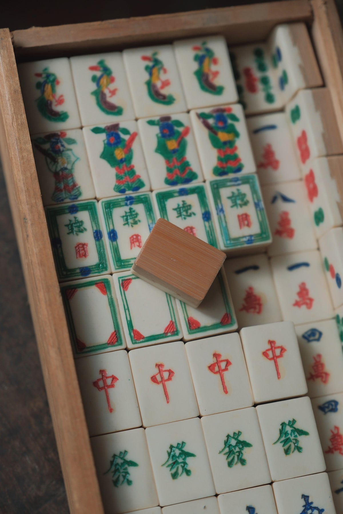 Vintage 1970s Bamboo-Backed Hand-Carved Sichuan style figure tile mahjong set.