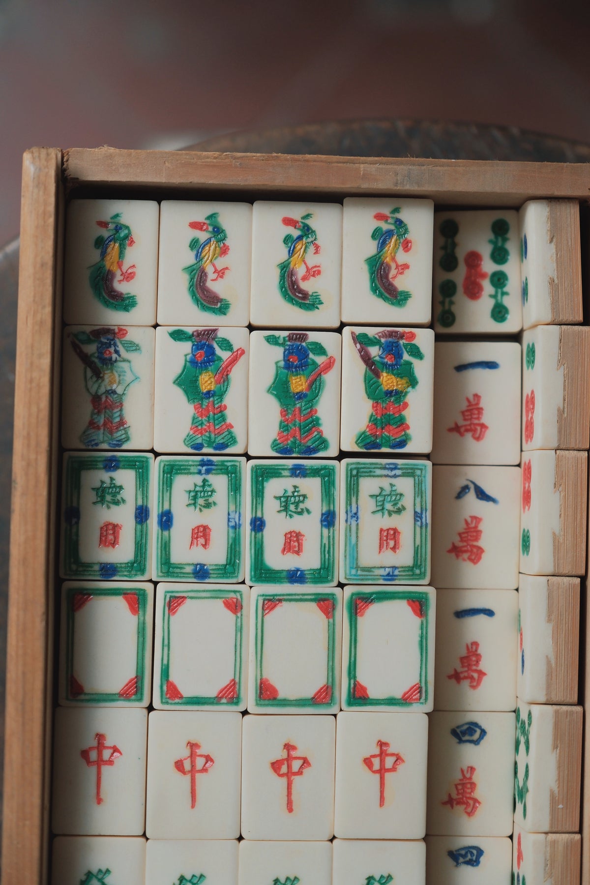 Vintage 1970s Bamboo-Backed Hand-Carved Sichuan style figure tile mahjong set.