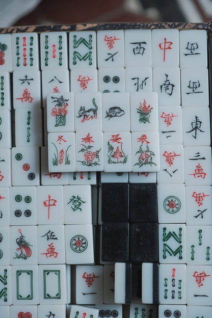 Vintage 1980s Hand-carved calligraphy style mahjong set with black backing